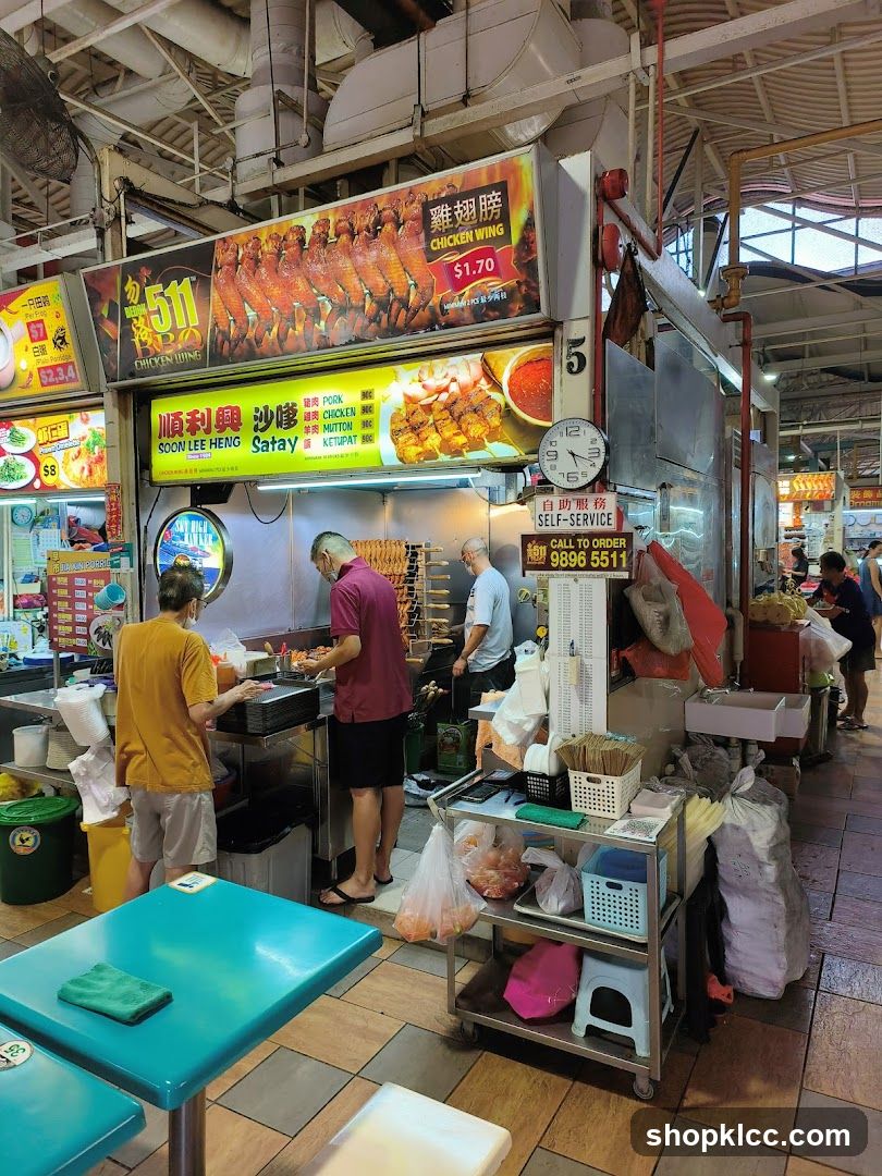 Food Stall with Chicken Wings and Satay