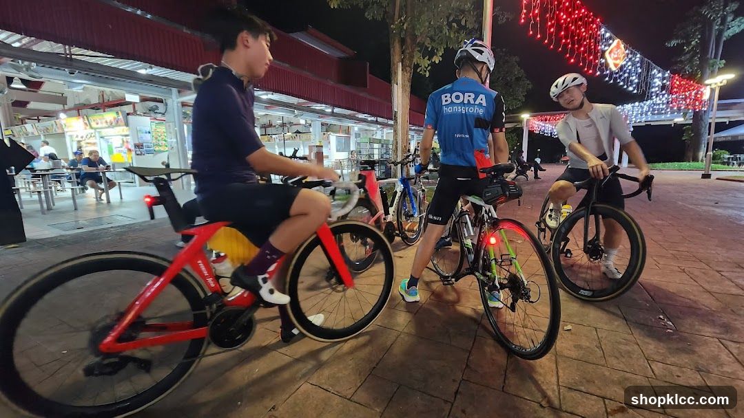 Cyclists at a food court