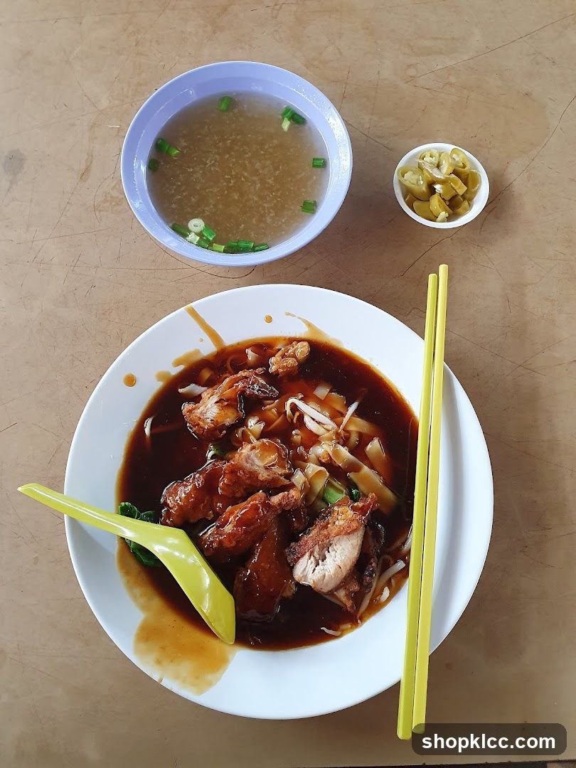 Noodle Dish with Soup and Pickled Chilies