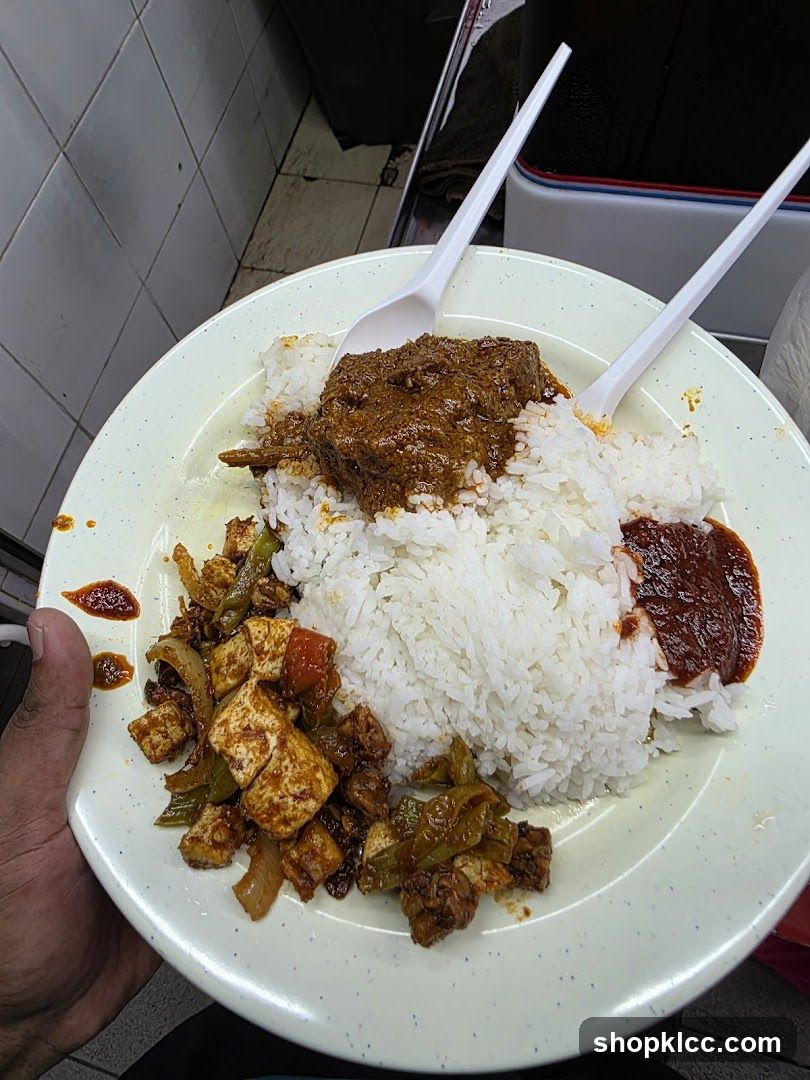 Plate of Rice with Meat and Vegetables