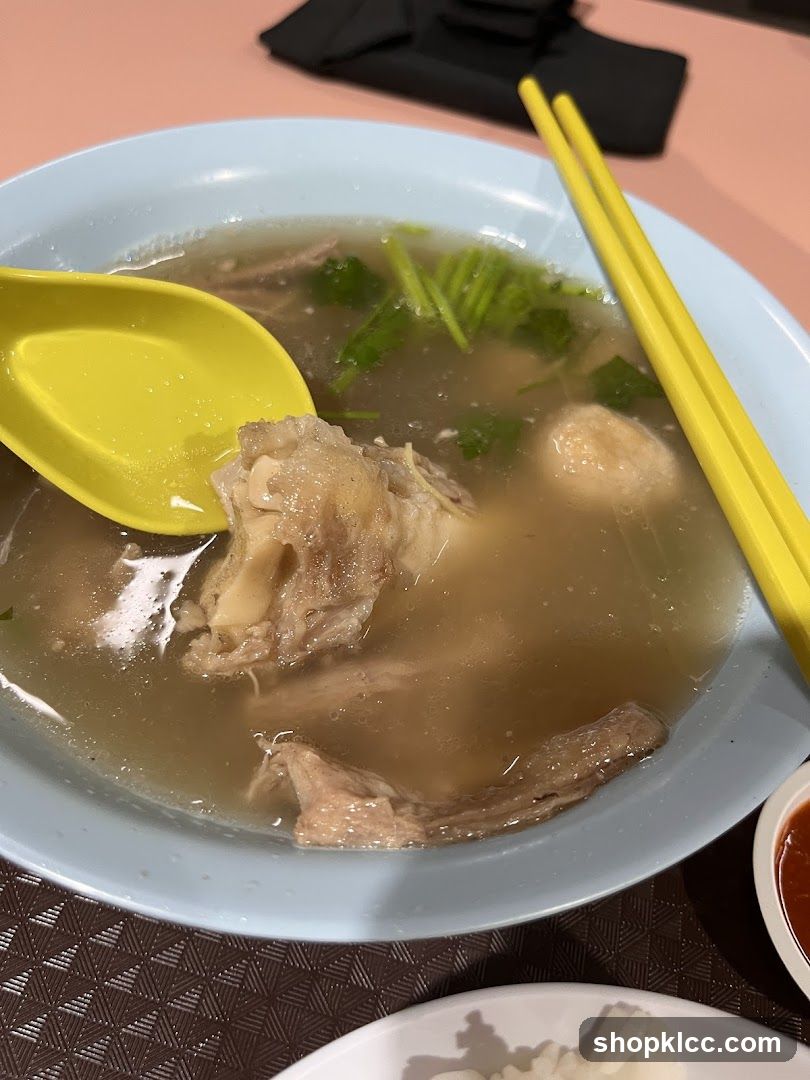 Bowl of Soup with Meat and Vegetables