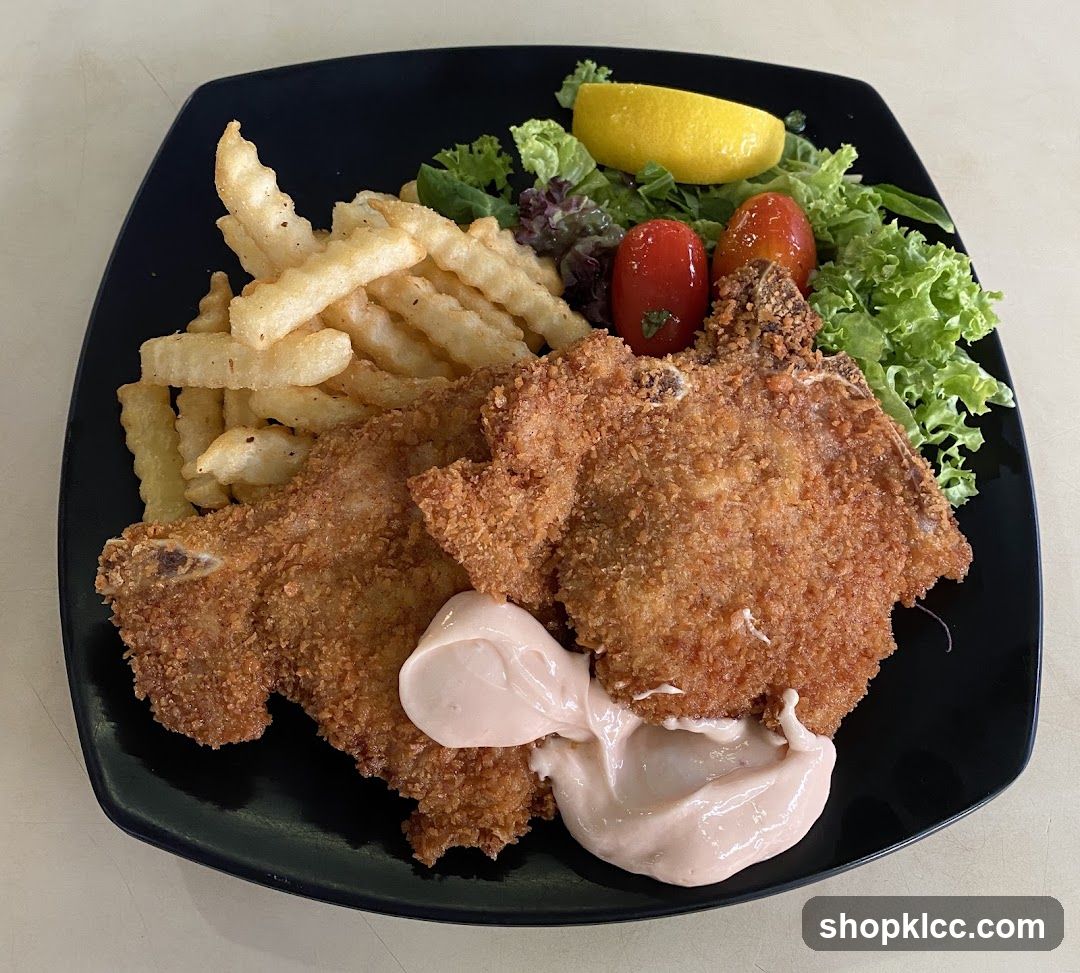 Pork Chop with Fries and Salad