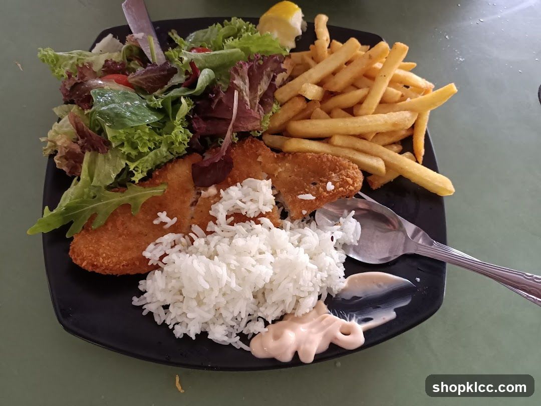 Fish and Chips with Rice and Salad