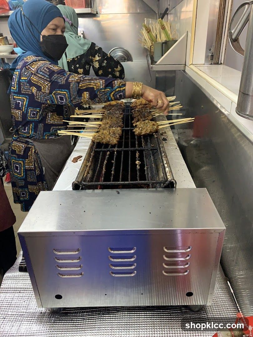 Satay being grilled