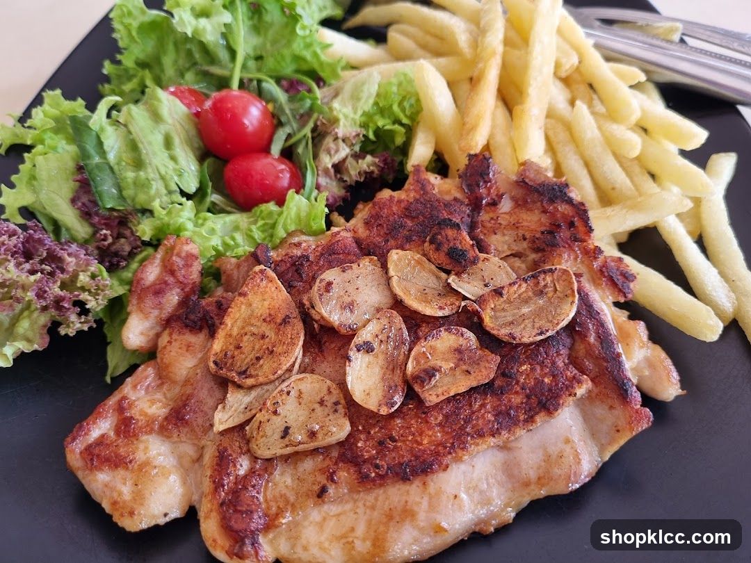 Garlic Chicken Steak with Fries and Salad