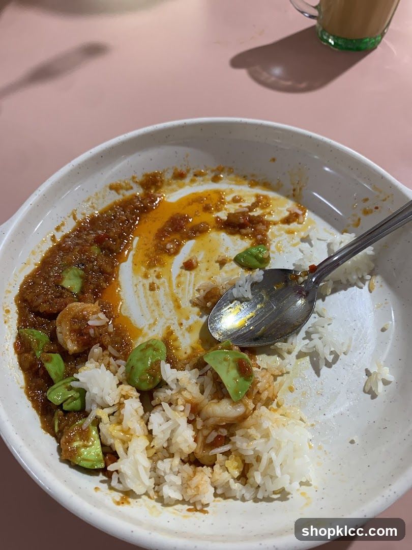 Partially Eaten Meal with Petai and Rice