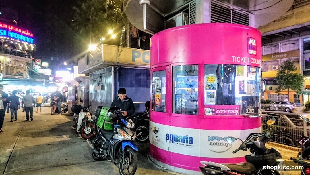 Night Market Scene with Ticket Booth