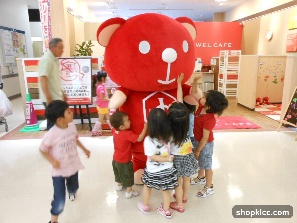 Children interacting with a mascot