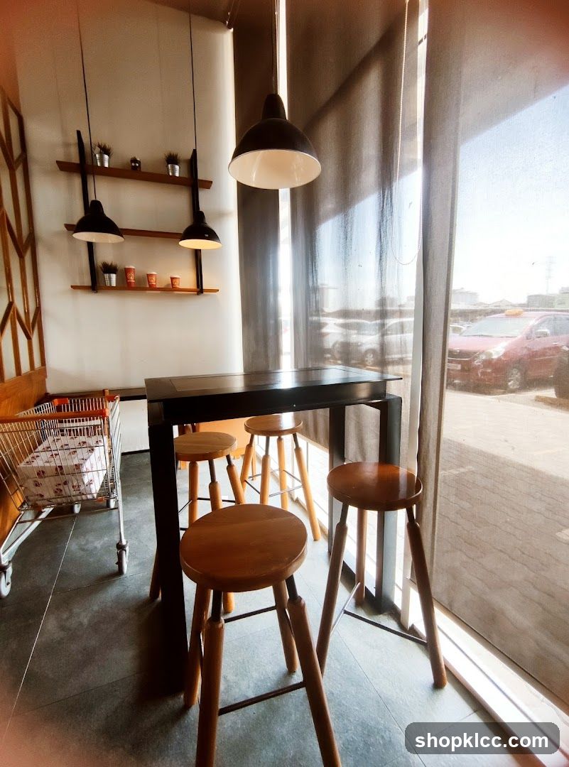Cafe Interior with High Table and Stools