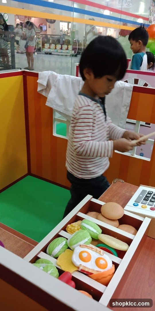 Children playing with toy food
