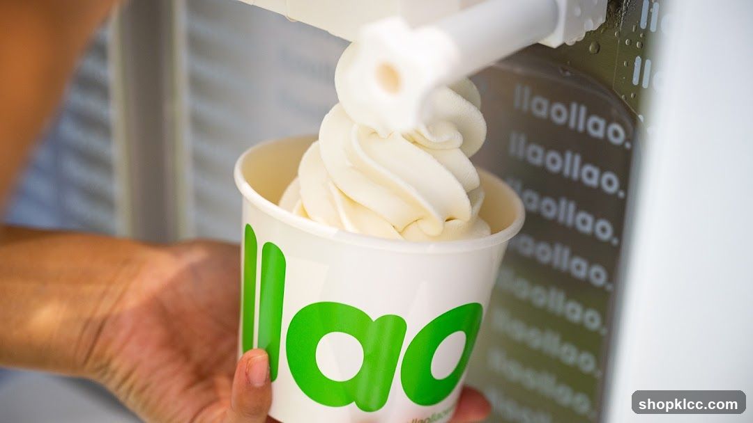 Yogurt being dispensed into a cup