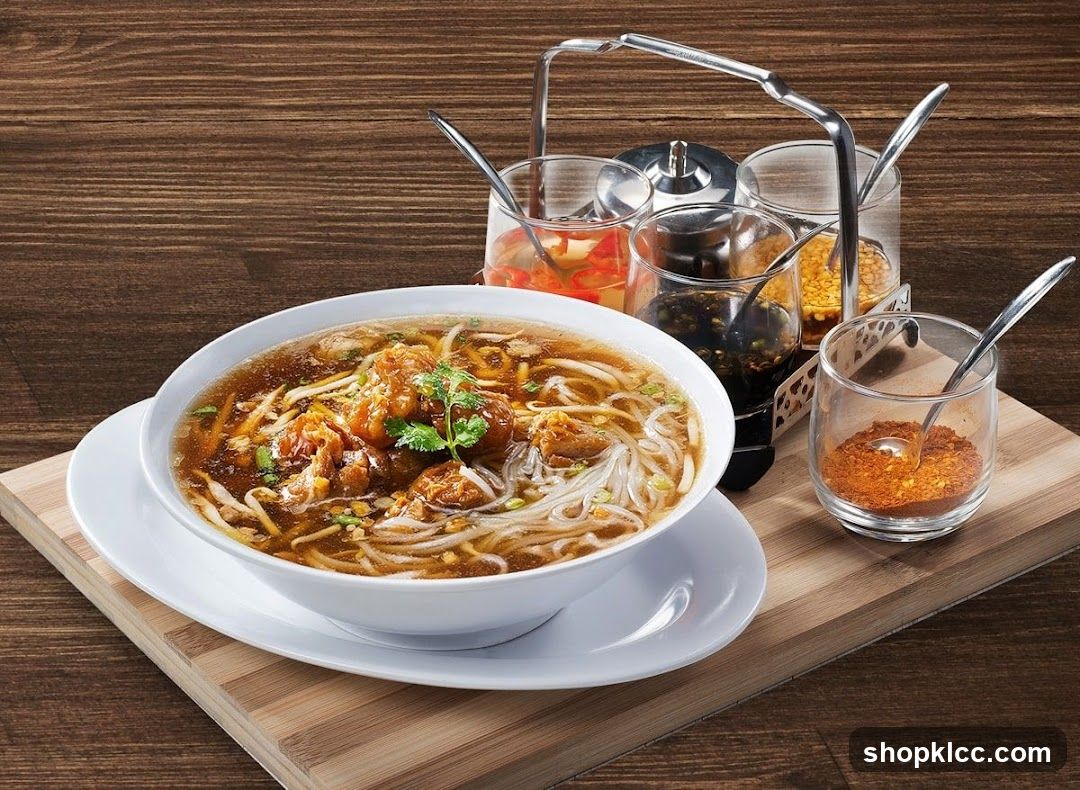 Bowl of Noodle Soup with Condiments