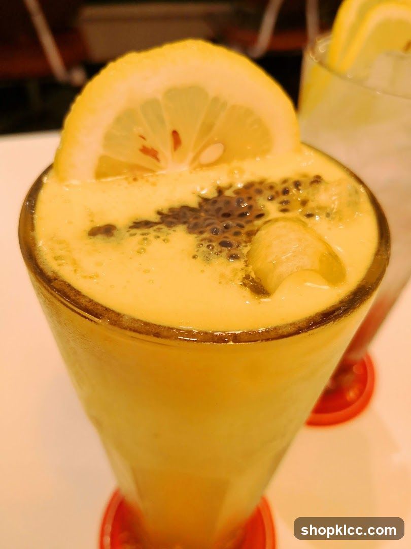 Yellow Drink with Lemon Slice