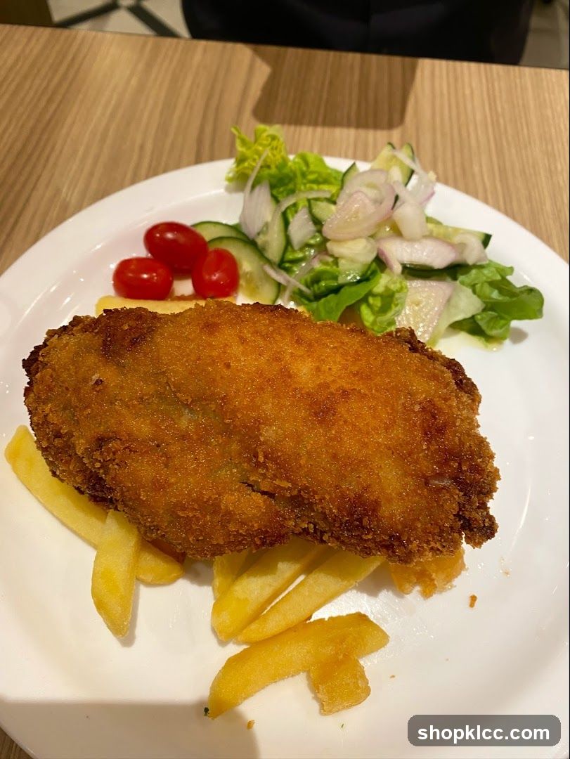 Breaded Cutlet with Fries and Salad