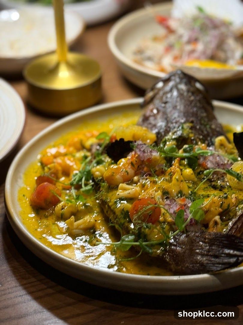 Whole Fish Dish with Sauce and Vegetables