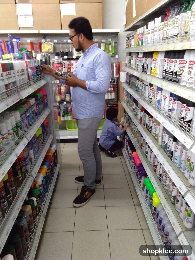 Aisle in a store with spray paint cans