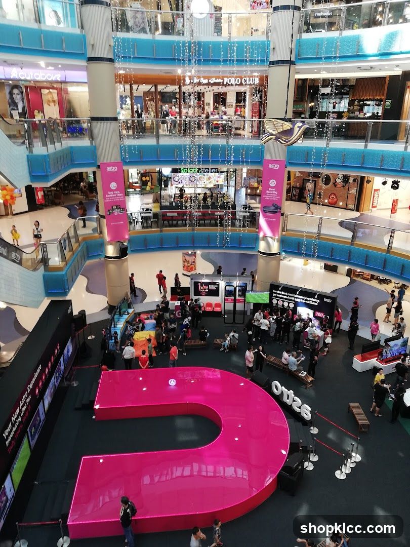 Mall Atrium with Large Pink 'U' Installation