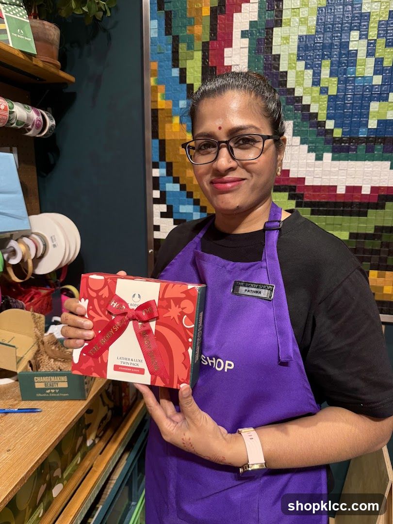 Employee holding a gift set