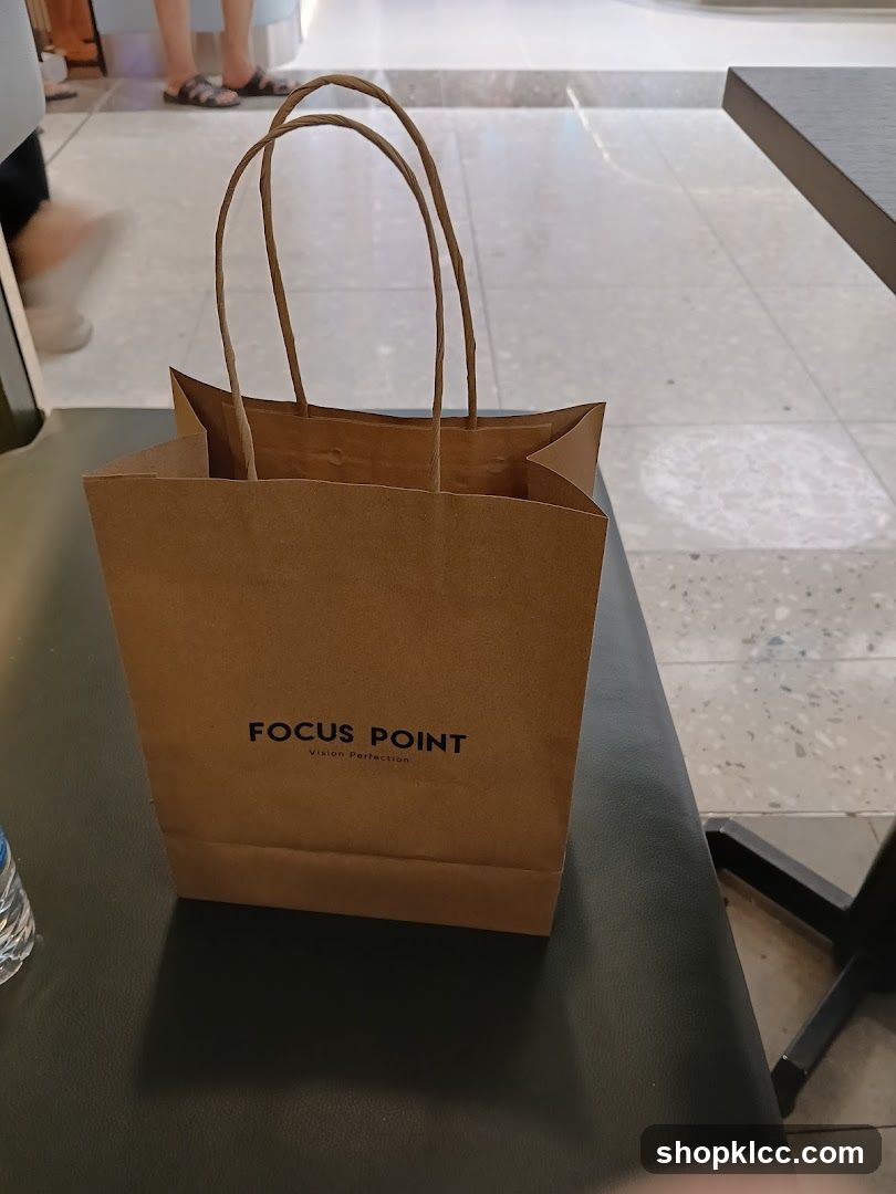 Brown paper bag with logo