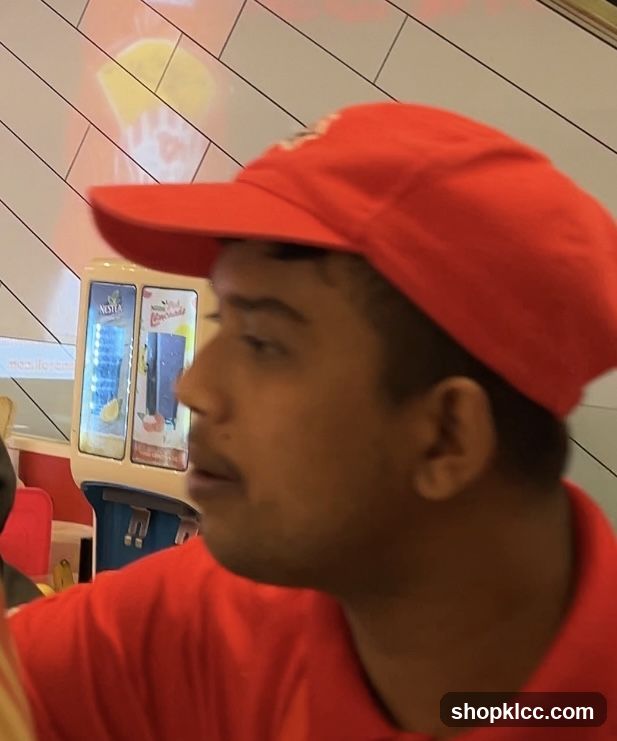 Employee at a Beverage Station