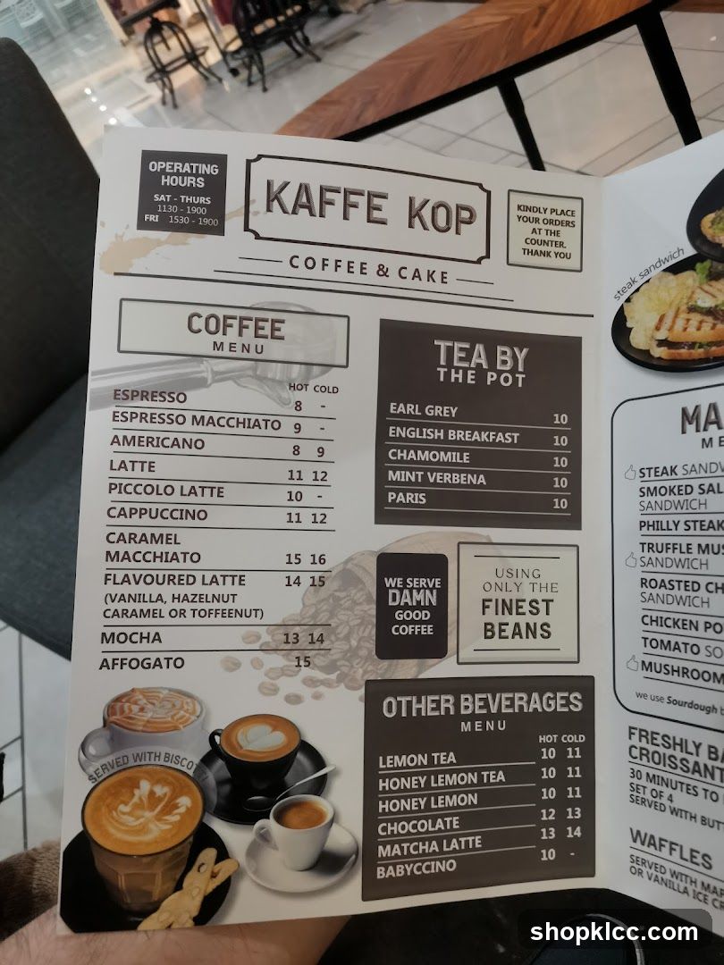 Menu for Kaffe Kop featuring coffee, tea, other beverages, sandwiches, croissants, and waffles.