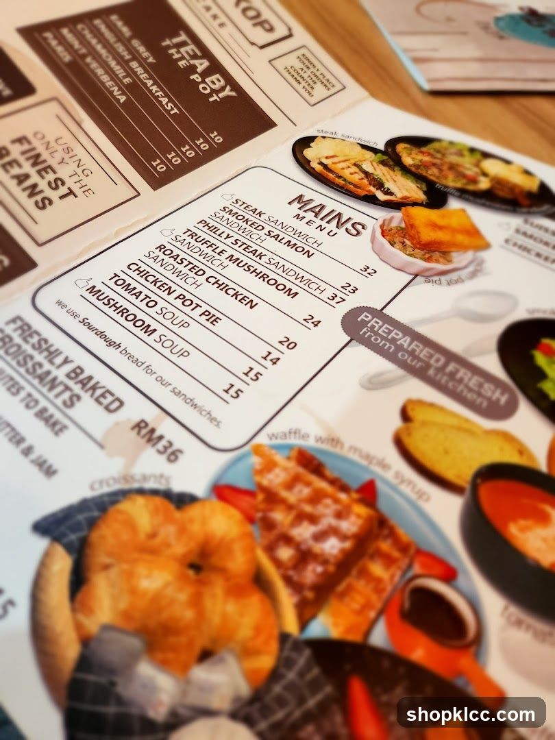 A menu featuring sandwiches, soups, and baked goods.