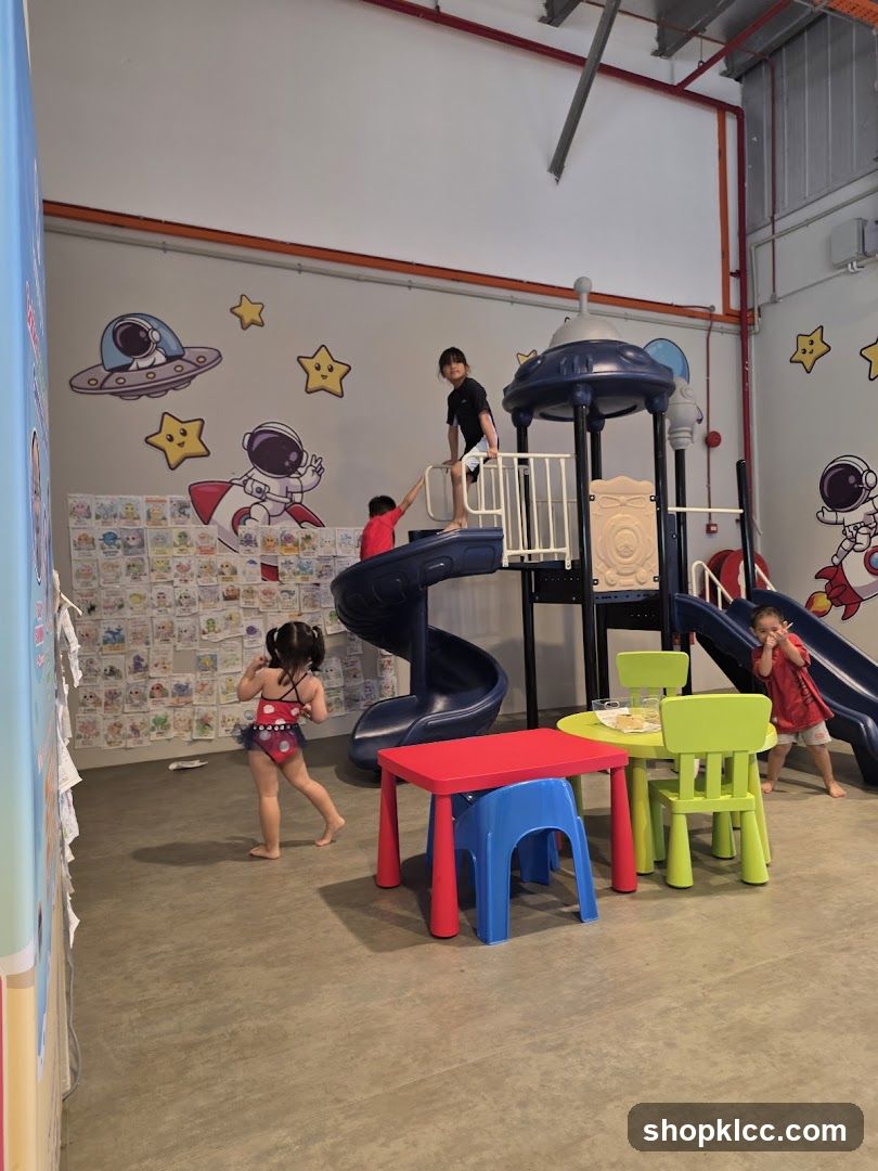Children Playing in a Space-Themed Indoor Playground