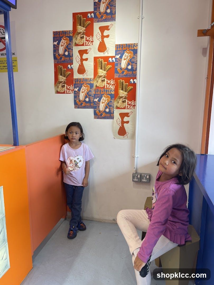Children in a colorful space with posters