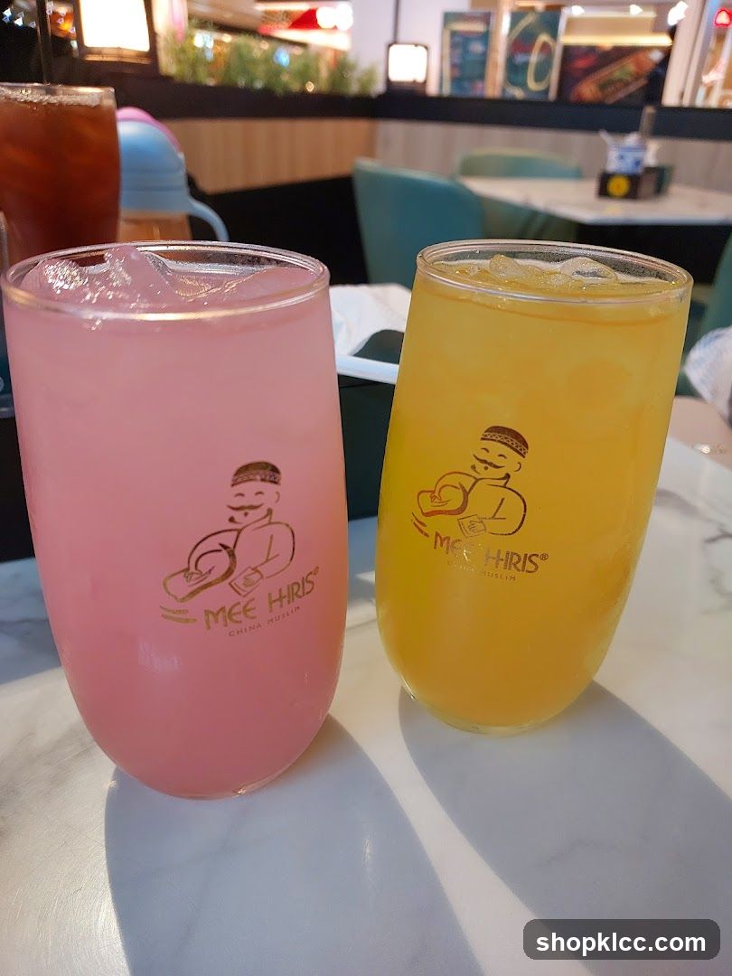 Two colorful drinks with logo