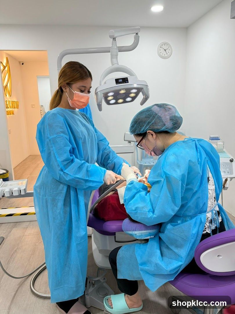 Dentist and assistant performing a dental procedure