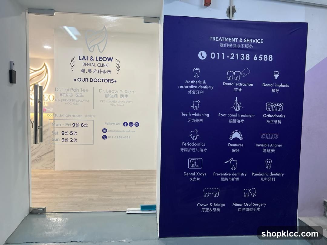 The image shows the glass entrance of a dental clinic. The clinic's name,