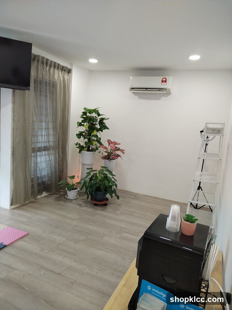 Interior of a room with plants and an air conditioner