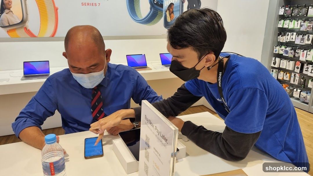 Salesperson assisting customer