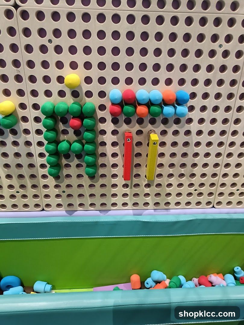 Pegboard with colorful balls and blocks