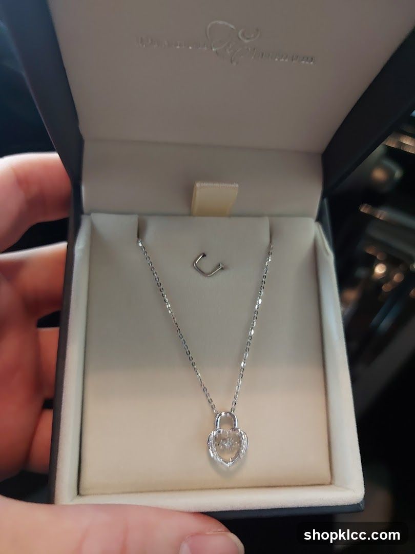 Heart-shaped locket necklace in a jewelry box