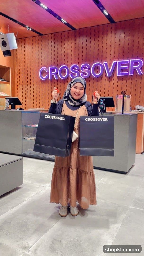 Woman holding shopping bags in a store