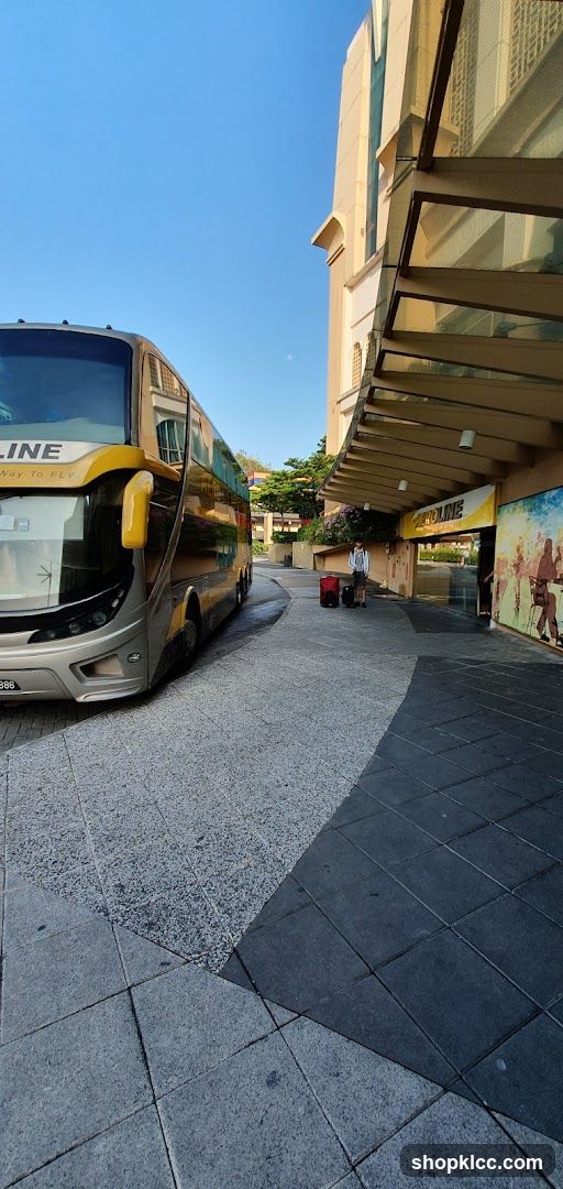 Bus parked near building entrance