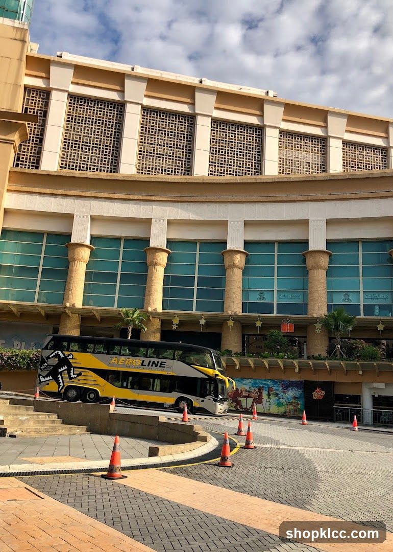 Double-decker bus parked in front of a building