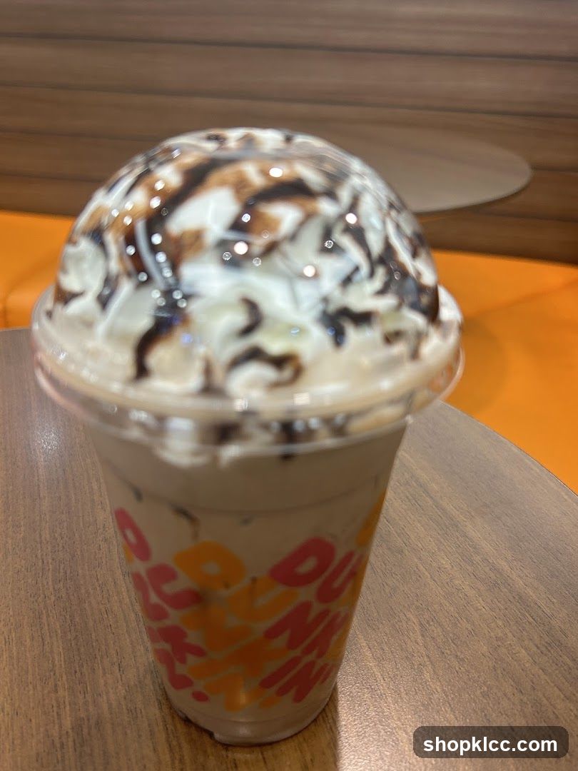 Iced Coffee with Whipped Cream and Chocolate Drizzle