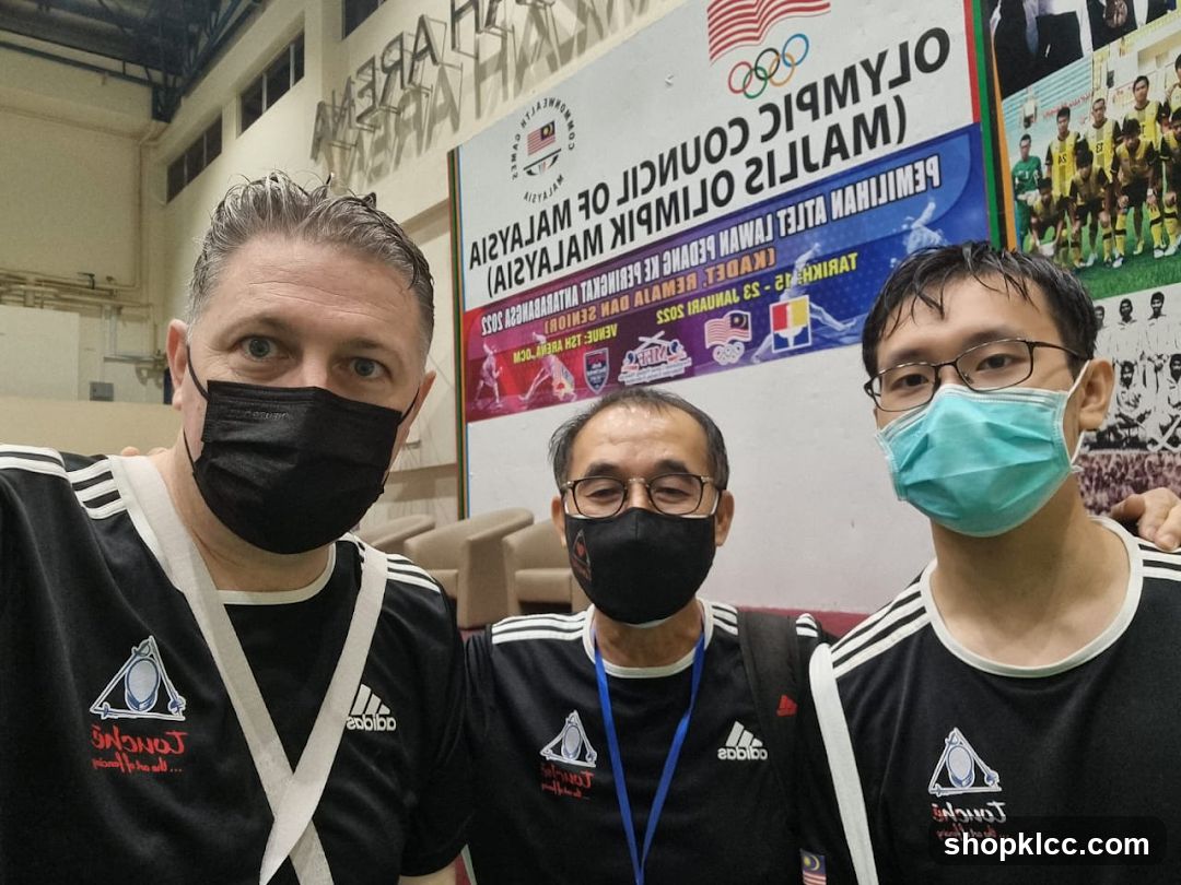 Three Men in Masks and Athletic Wear