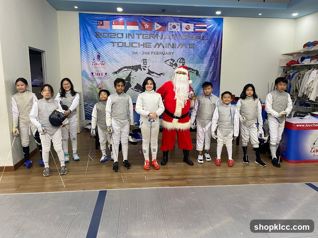 Fencing competition participants with Santa