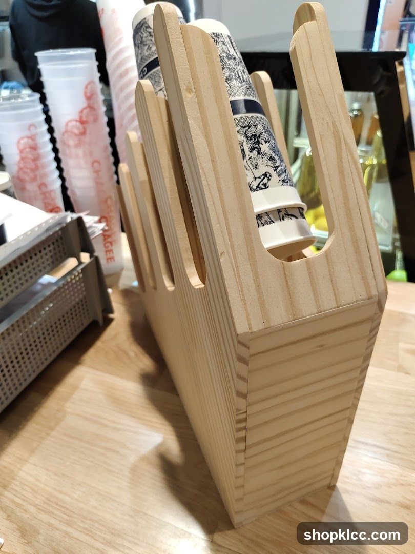 Wooden cup holder with stacked cups