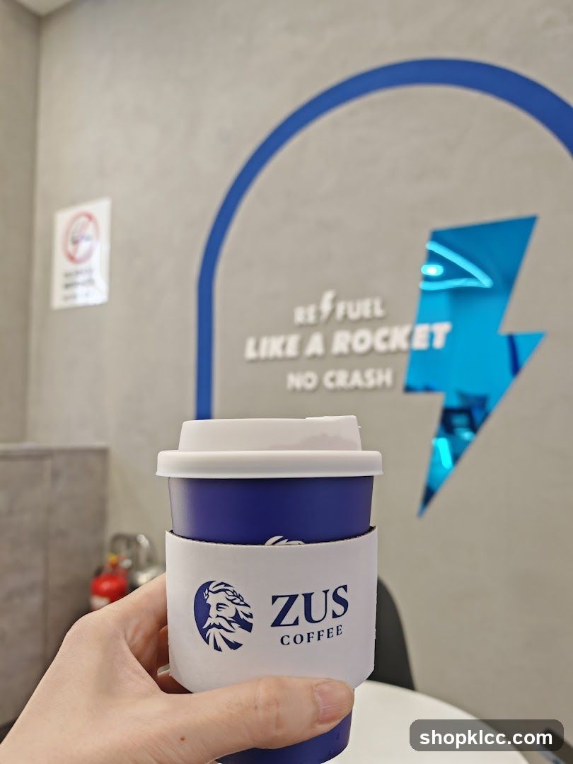 Coffee Cup with ZUS Coffee Logo