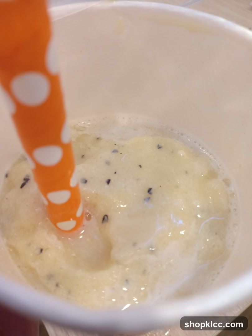 Close-up of a smoothie with a straw
