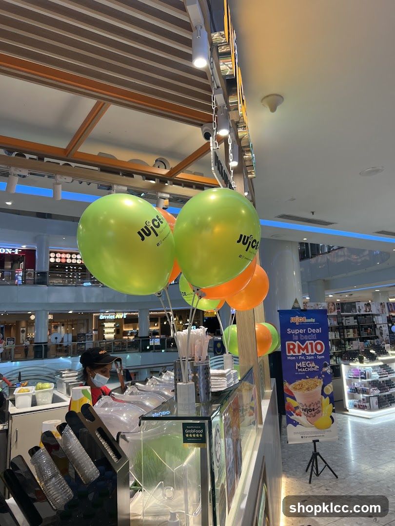 Juice Bar Counter with Balloons and Promotion