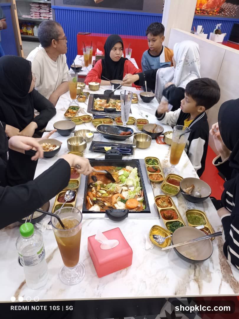 Family enjoying a meal at a restaurant