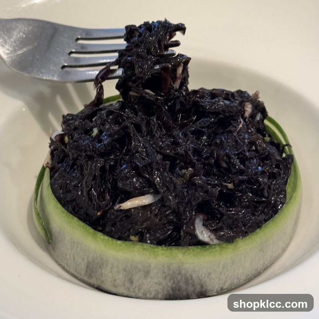 Dark Seaweed Salad with Cucumber Garnish