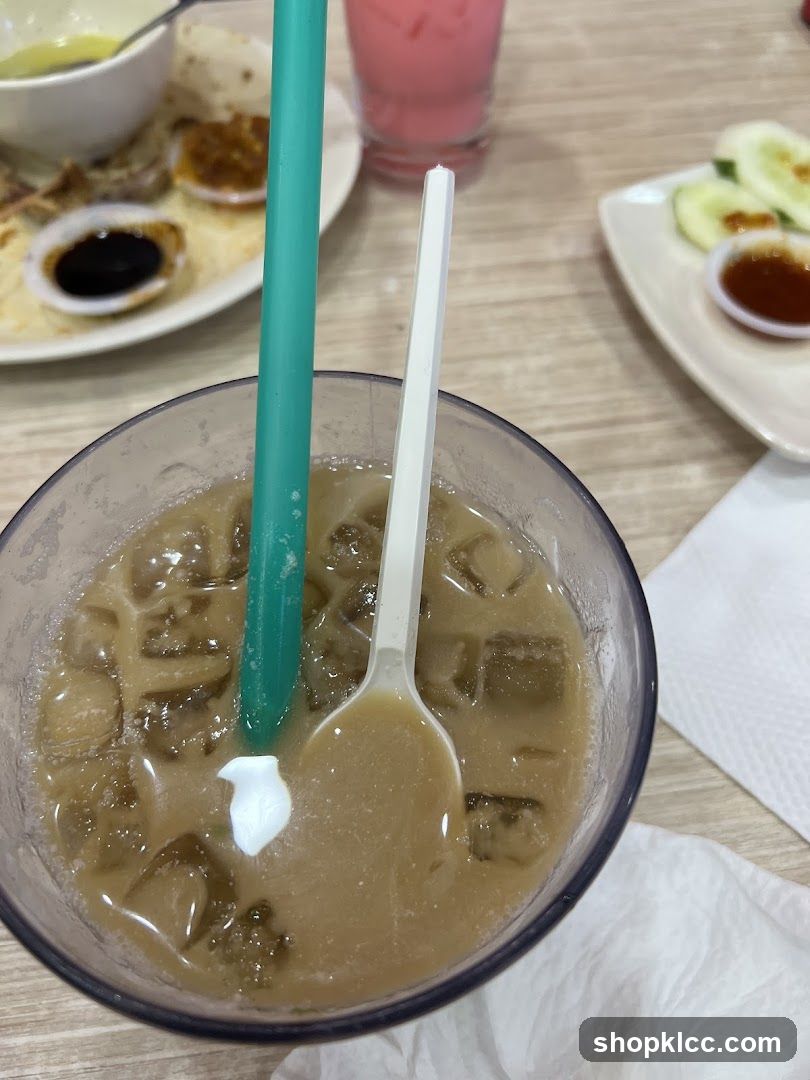 Iced Coffee with Spoon and Straw