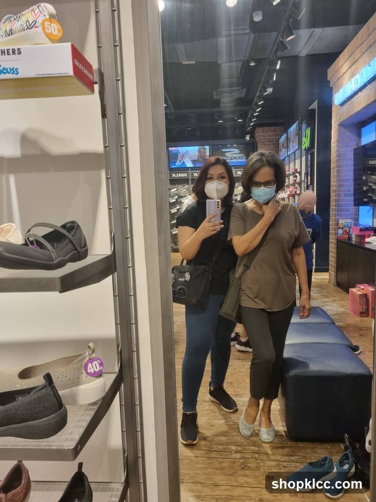 Two Women in a Shoe Store