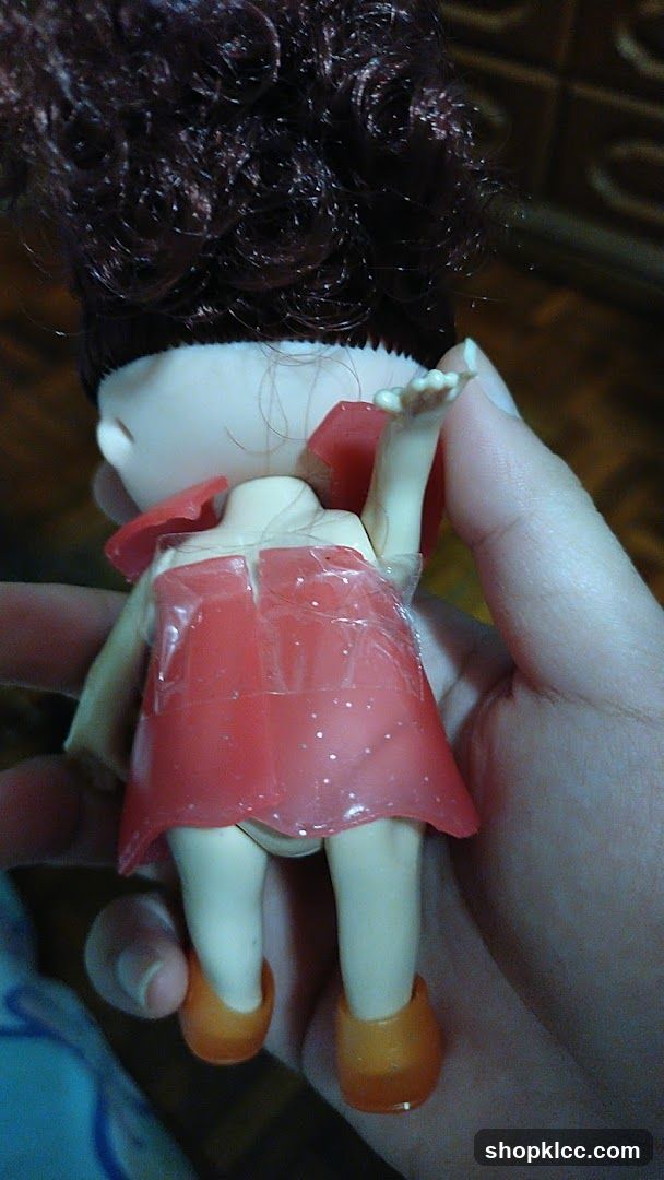 Doll with red dress